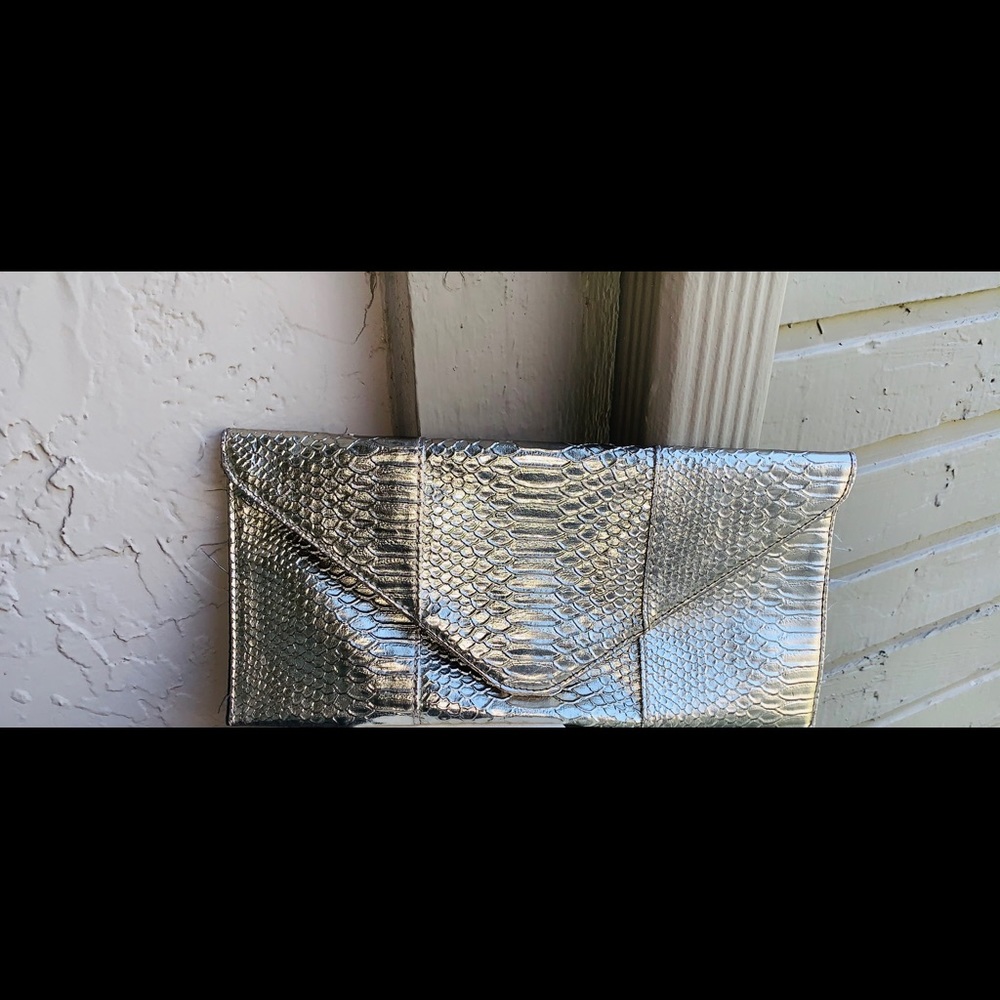 Silver exotic clutch